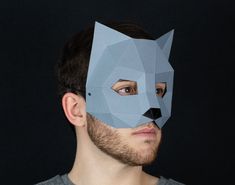 Make your own 3D cat masquerade with paper or cardboard at home in minutes thanks to our printable template for kids and adults. ⚡ If you purchase this product you will have instant access to the PDF file (with easy-to-follow instructions and pattern) so you can print, assemble and customize the papercraft mask to your liking." 📐 Mask dimensions: 14,6 cm x 17 cm x 12,8 cm / 5.7'' x 6.7'' x 5.0''. 📌 PDF content: 6 pages, 8 pieces. 🌲 For every mask you buy, we plant a tree!  ➤ https://hekreatio Template Papercraft, Cat Mask Diy, Papercraft Mask, Paper Mask Template, Low Poly Mask, Mascaras Halloween, Printable Masks, Lion Mask, Fox Mask