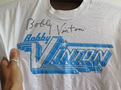 "Vintage Bobby Vinton T Shirt Pop Music Bobby Vinton Classic Logo Tee 1993 Autograph Single Stitch Rare Music T Shirt Blue Velvet o Size armpit to armpit 21\" top to botton 29\" shoulder width 20.5\" (inch) o Fabric Cotton 50% Polyester 50% assemled in Dominican of U.S.A. o Condition vintage Condition 8.5/10 oo If you are in any interested and have any questions? Please do ask me on various details, I am more than happy to help oo \" Shipping Wordwide\" registered airmail thailand post (small pa Retro Shirt Design, Bobby Vinton, Music T Shirt, Retro Band, Typography Shirts, Vintage Band Tees, Shirt Design Inspiration, Velvet Shirt, Vintage Records