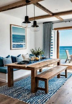 a living room filled with furniture and an ocean view