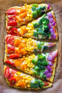 a pizza with many different toppings on top of it, including broccoli and corn