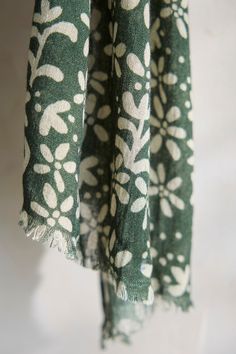 A whimsical floral print tops off this luxurious and generously sized wool blend scarf from Elizabeth Gillett. Each scarf design starts off as an original painting and is then translated into a digital print. Elizabeth's low-impact digital printing method consumes less water than other printing methods. Scarf Design, Green Wool, Floral Print Tops, Wool Scarf, The Happy, Printing Methods, Scarf Shawl, Digital Printing, Print Tops