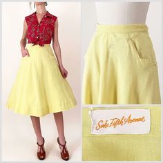 1950s Saks Fifth Avenue lemon yellow linen skirt. Scalloped pockets with western stitching details. Metal side zipper with hook closures at the waist. Slightly sheer. Shown with a petticoat underneath (not included). In great vintage condition - please see photos.  All measurements are taken with the garment laying flat and doubled for the bust, waist, and hips.  Waist: 27" Hips: 50" Length: 27" Label: Saks Fifth Avenue Material: Not listed; looks/feels like linen Size on Tag: N/A Approx. Fit: 2 Vintage Fitted Skirt With Pockets, Fitted Vintage Skirt With Pockets, Vintage Yellow Cotton Skirt, Vintage Skirt With Pockets, Yellow Circle, Horse Vintage, Stitching Details, Cat Walk, Linen Skirt