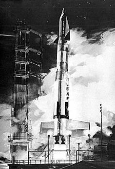 an old black and white photo of a rocket