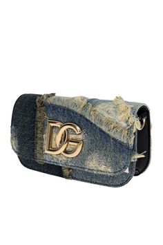 This bag is crafted of patchwork denim cotton and leather trim and features interchangeable shoulder straps: leather top-handle and chain crossbody for styling options. Detachable top handle Detachable chain crossbody strap Flap top with magnetic closure Interior slip pocket Approx. 4.3"H x 7.5"W x 2"D Made in Italy Patchwork Denim, Denim Patchwork, Denim Cotton, Blue Bags, Crossbody Strap, Leather Top, Leather Trim, Magnetic Closure, Leather Trims