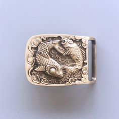 Double Fishes Rectangle Solid Brass Belt Buckle Brand New In Stock Only Buckle No Belt SKU:BUCKLE-BS012 Material is Solid Brass Length Size is, 2.76 inches, Height Size is, 1.97 inches, Weight is 4.59 oz Length Size is,70 mm, Height Size is, 50 mm, Weight is 130 g The inner diameter for back loop is, 1.58 inches (40 mm), fits belt up to 1.58 inches (40 mm) Width Screws On Button Snap On Belts All of our buckles is fitting to all of our Screws On Button Snap on Belts you could please choose your Fun Belt Buckles, Cool Belts For Men, Fish Belt, Cool Belt, Buckle Outfits