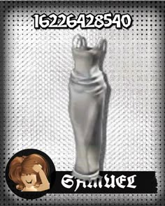 a silver statue with the words smile on it's side and an image of a woman