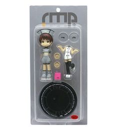 an action figure set in the package with buttons and keychains on it's side