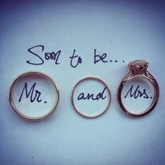 three wedding rings with the words soon to be mr and mrs written on them in cursive writing