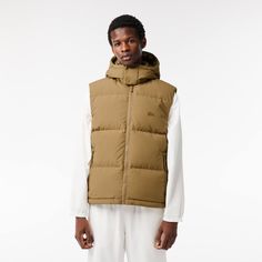 This super-warm, down-lined puffer jacket is a lesson in Lacoste quality and style Hip and packed with clever details, perfect for layering over your everyday looks. Lacoste Puffer, Puff Vest, Gym Wear For Women, Man Down, Lacoste Men, Outerwear Vest, Mens Essentials, Down Vest, 2024 Collection