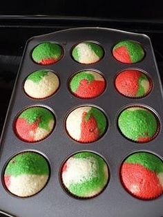 cupcakes decorated with the colors of italy and green are in a muffin tin