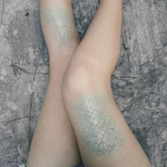 the legs are covered in silver glitter