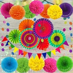 colorful party decorations with paper fans and streamers