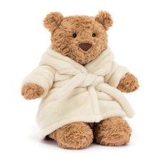 a teddy bear wrapped in a towel