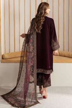 Brand: JazminProduct Code: VF-2012Collection: Jazmin Unstitched Autumn Winter Velvet CollectionFabric: Velvet DESCRIPTION: Elevate your formal wardrobe with the Embroidered Velvet Formal VF-2012. Crafted with pure velvet featuring intricate embroidery on the front and side panels, sleeves and trouser, and a digital printed organza dupatta, this outfit exudes elegance and sophistication. Perfect for any formal occasion, you'll make a lasting impression with its luxurious velvet finish and delicate embroidery details. DESIGN DETAILS Embroidered Pure Velvet Front & Side Panels Embroidered Pure Velvet Sleeves & Trouser Embroidered Pure Velvet Dupatta Border Embroidered Pure Velvet Front & Back Border Embroidered Pure Velvet Sleeves Border Digital Printed Embroidered Organza Dupatta DISCLAIMER: Velvet Kurta, Velvet Dupatta, Velvet Sleeve, Velvet Suit, Pakistani Salwar Kameez, Chiffon Collection, Party Kleidung, Velvet Collection, Modest Wear