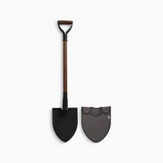 two shovels with wooden handles are shown against a white background, one is black and the other is gray