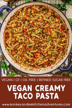 vegan creamy taco pasta in a skillet with the title above it