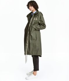 DESCRIPTION Parka in cotton twill with detachable, quilted lining in woven fabric. Detachable hood, high stand-up collar, and zip and wind flap at front with snap fasteners. Handwarmer pockets with flap, buttons at cuffs, and drawstring at waist and hem. Vent at back. DETAILS 100% cotton. Machine wash warm Imported View Size Chart Anorak Jacket Outfit, Grey Parka, Green Parka, Drawstring Jacket, Military Looks, Long Wool Coat, Anorak Jacket, Snap Fasteners, Detachable Hood