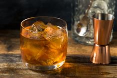 a close up of a drink in a glass on a table