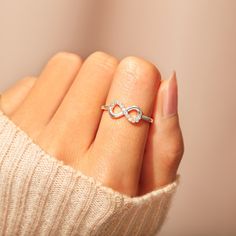 DESCRIPTIONWith a meaningful message card included, this infinity ring is a wonderful gift for either a daughter or a mother. It serves as a reminder that the love between you two is forever.CARD MESSAGEI love you until infinity runs out.SPECIFICATIONSStone: AAA Grade Cubic ZirconiaMetal: 925 Sterling SilverNickel and Tarnish FreeFREE Original Message Card Ring For Girlfriend, Minimalist Bangle, Off Shoulder Floral Dress, Lace Tube Top, Friendship Necklaces, Infinity Ring, Polish Remover, A Daughter, Zircon Ring