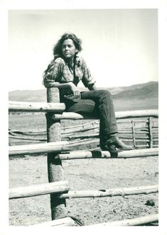 Jane Fonda sitting on a fence on the Ranch Lily Tomlin, Buckle Bunny, Western Photoshoot, Cattle Ranch, Cowgirl Aesthetic, Vintage Cowgirl, Jane Fonda, Cowgirl Outfits, Photography Wall