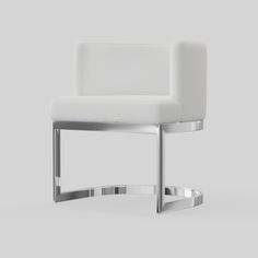 a white chair sitting on top of a gray floor