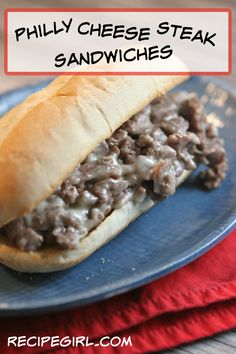 a close up of a sandwich on a plate with the words phily cheese steak sandwiches