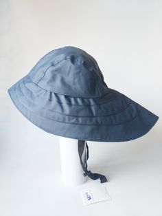 Original North German rain hats with long back brim to protect from rain. Rain Bonnet Vintage, Solid Waterproof Bucket Hat, Waterproof Wide Brim Bucket Hat With Adjustable Fit, Adjustable Waterproof Sun Hat With Curved Brim, Waterproof Adjustable Sun Hat With Curved Brim, Waterproof Brimmed Beach Hat, Waterproof Wide Brim Sun Hat For The Beach, Waterproof Wide Brim Sun Hat For Beach, Wide Brim Weatherproof Hat For Outdoor