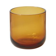 Stylishly minimalist with a trendy amber hue, the Las Positas votive offers function & flair to any tablescape. Made from handmade, mouth-blown glass, this piece has a nice weight but small size, perfect for juice, cocktails, or even votive candles. Small: 3in Dia x 3in H, Large: 3in Dia x 6.25in H Finish: Green, Purple or Yellow Material: Glass Set of 4 Imported Shop more Hype Decor Drinking Glass Sets, Water Into Wine, Glass Mason Jars, Highball Glass, Old Fashioned Glass, Wine Glass Set, Glassware Set, Drinking Glass, Modern Glass