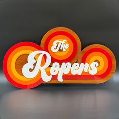 a wooden sign that says the ropens on it's front and back sides