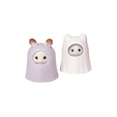 two little animals are standing next to each other on a white background, one is wearing a purple cloak and the other has an animal's eyes