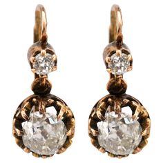 Center Stone: 4 Diamonds Cut: Old Mine Cut Weight: 2.50 Carat Color: K-L Clarity: SI Metal: 18K Yellow Gold Era: Modern Circa: 2020s in The Style of Antique Hallmarks: Stone Weight Engraved Size: 3/4 inches long Gram weight: 4.57 These stunning earrings showcase 4 old mine cut diamonds with a total weight of 2.50 carats. The diamonds, with their K-L color and SI clarity, are elegantly set in 18K yellow gold, exuding a classic charm reminiscent of antique designs. Crafted in the 2020s, these earr Colored Stone Engagement Rings, Earring Video, Yellow Gold Drop Earrings, Vintage Drop Earrings, Stone Engraving, Platinum Diamond Engagement Rings, Yellow Gold Earring, Stunning Earrings, Gold Drop Earrings