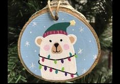 a christmas ornament with a polar bear on it