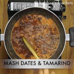 mash dates and tamarind cooking in a pan