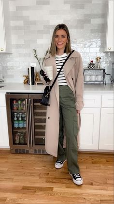 Khaki Combat Trousers Outfit, Green Khakis Outfit Women, How To Style Khaki Cargo Pants Women, Green Combat Pants Outfit, Olive Green Work Pants Outfit, Wide Leg Utility Pants Outfit, Green Cargo Joggers Outfit Women, Cargo And Converse Outfit, Green Olive Cargo Pants Outfit