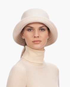 A cozy, lightweight women's bucket hat of spun wool with trapunto stitched brim rolls up easily into a coat pocket or a tote bag. Eric says, "It's definitely a bucket hat season where the attitude is a bit more casual than a fedora." What makes this women's bucket hat most desirable is that the crown is spun and then blocked to achieve the shape; The crown has no visible seams so it doesn't feel thick, while providing great insulation and protection from the elements. Brim span: 2.75"(7cm) Fully Beige Brimmed Felt Hat For Winter, Beige Felt Hat With Short Brim For Winter, Beige Short Brim Felt Hat For Winter, Wool Bucket Hat With Curved Brim For Fall, Beige Wool Felt Hat For Winter, Chic Wool Cloche Hat For Winter, Winter Beige Wool Felt Hat, Casual Wool Cloche Hat For Winter, Classic Winter Bucket Hat