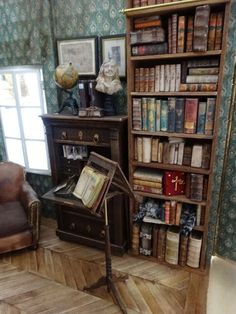 an old fashioned desk and chair in a room with bookshelves