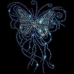 an image of a butterfly made out of blue and white beads on black background with stars