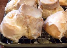 glazed donuts with icing on a cooling rack