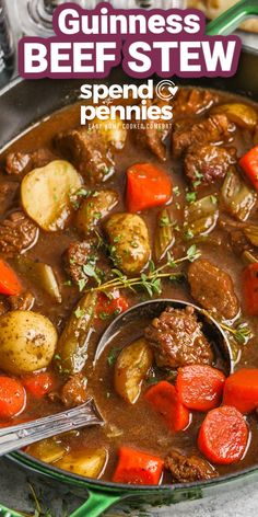 a pot filled with beef stew and carrots