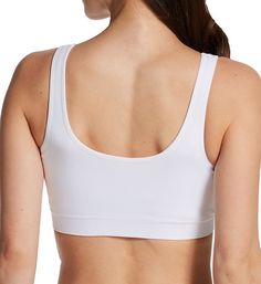 Convenient and comfortable seamless bra has knit-in support with an allover flexing design that's comfortable enough to sleep in. Wireless, seamless stretchy molded cup expands and contracts in all directions for a unique supportive fit. 4-way stretch fabric for incredible adaptive stretch that doesn't bind or shift. Cup is lined with same fabric to create a pocket that allows you to insert removable padding or a breast form, not included. Front hook-and-eye closure has a plush backing panel for White Seamless Micro-elastic Bra, Supportive Seamless Sports Bra For Relaxation, Sports Bra With Micro-elastic Fit And Soft Touch, Sports Bra With Soft Touch And Micro-elastic Fit, Sports Bra With Micro-elastic Soft Touch, White Bra With Seamless Construction And Medium Support, No-show Sports Bra With Built-in Support, White Full Coverage Sports Bra With Seamless Construction, Supportive Seamless White Bra