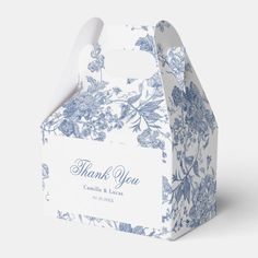 Enchant your guests with a touch of Parisian charm and a delightful treat nestled inside this elegant French vintage blue floral Jouy favor box.

Enchanting Elegance:

Rich Blue: The box boasts a luxurious blue hue, evoking a sense of sophistication and timeless style.
French Jouy Charm: Delicate florals and whimsical motifs in a classic Jouy design adorn the box, adding a touch of whimsical elegance.
High-Quality Material: Crafted from sturdy yet beautiful cardboard or paperboard, it ensures yo Blue Blush Wedding Theme, Vintage Box Design, Rehearsal Dinner Gifts For Guests, Wedding Guest Gifts Party Favors, Luxury Box Design, Wedding Guest Gifts, Gift For Guests, Hamptons Wedding, Floral Party