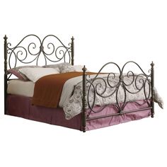 a metal bed frame with pink sheets and pillows on it's headboard, in front of a white background