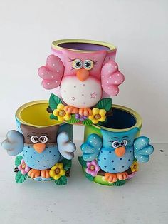 three owl planters sitting on top of each other