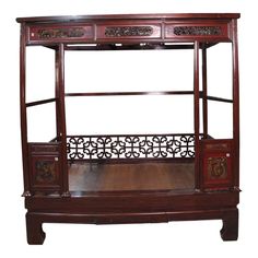 In its original condition, this mid 20th century antique Chinese canopy bed is crafted by the skilled artisans of Fujian province in the 20th century, The rails are formed by beautiful hand made fretwork. Intricate carving of decorative patterns and people in the gardens adorned this antique Chinese canopy bed/wedding bed.   Impeccably handcrafted, the canopy and rails are ingeniously interlocked using the precise and enduring technique of tenon and mortise joinery. The canopy itself is a work o Canopy Bed Wood, Chinese Bed, Moon Bed, Intricate Carving, Wedding Bed, Wedding Canopy, Bed Wood, Four Poster, Canopy Bed