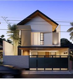 an artist's rendering of a modern house in the evening with cars passing by