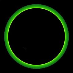 a black background with a green circle in the center