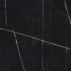 black marble with gold lines in the middle and one white line on the other side