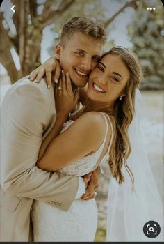 a bride and groom embracing each other in front of trees with the caption's name on it