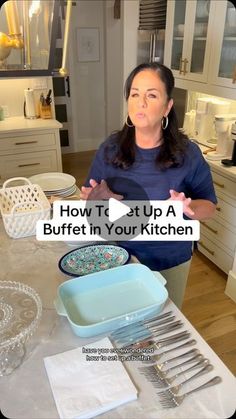 a woman standing in front of a kitchen counter with silverware on it and the words how to set up a buffet in your kitchen