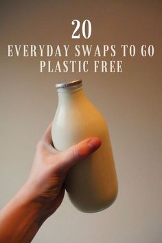 a hand holding a bottle with the text 20 everyday swaps to go plastic free